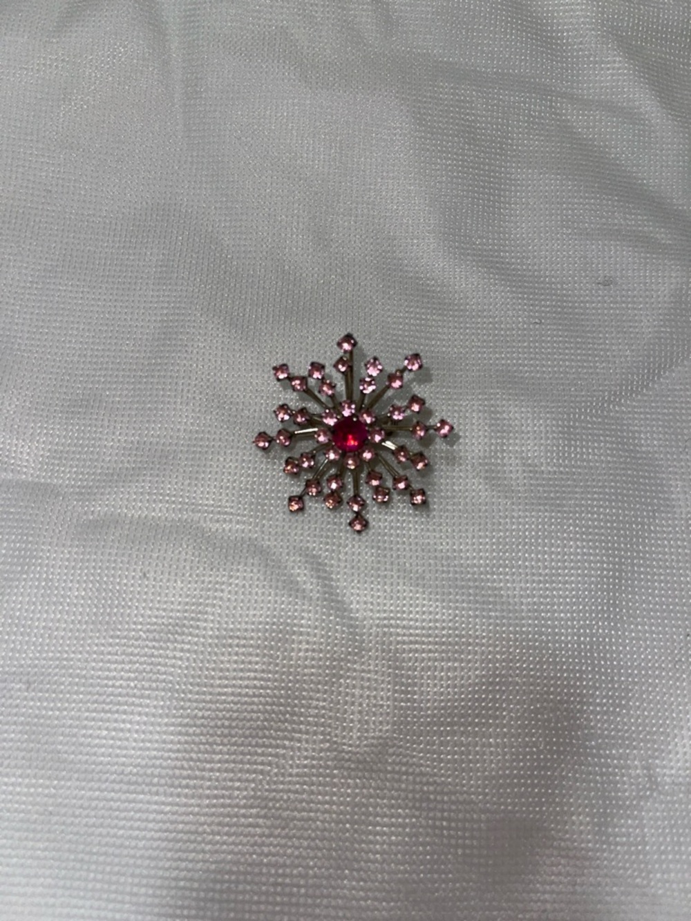 Pink brooch patina